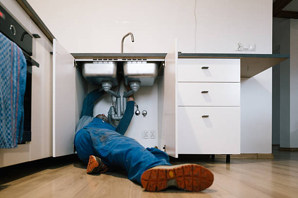 Professional Emergency Plumber technician working in Houston, PA